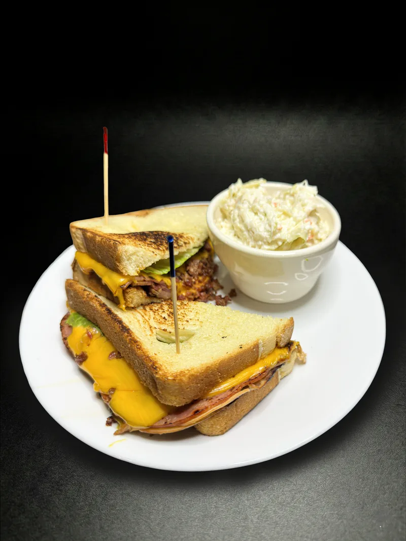 Club sandwich with coleslaw at Macarena's Kitchen