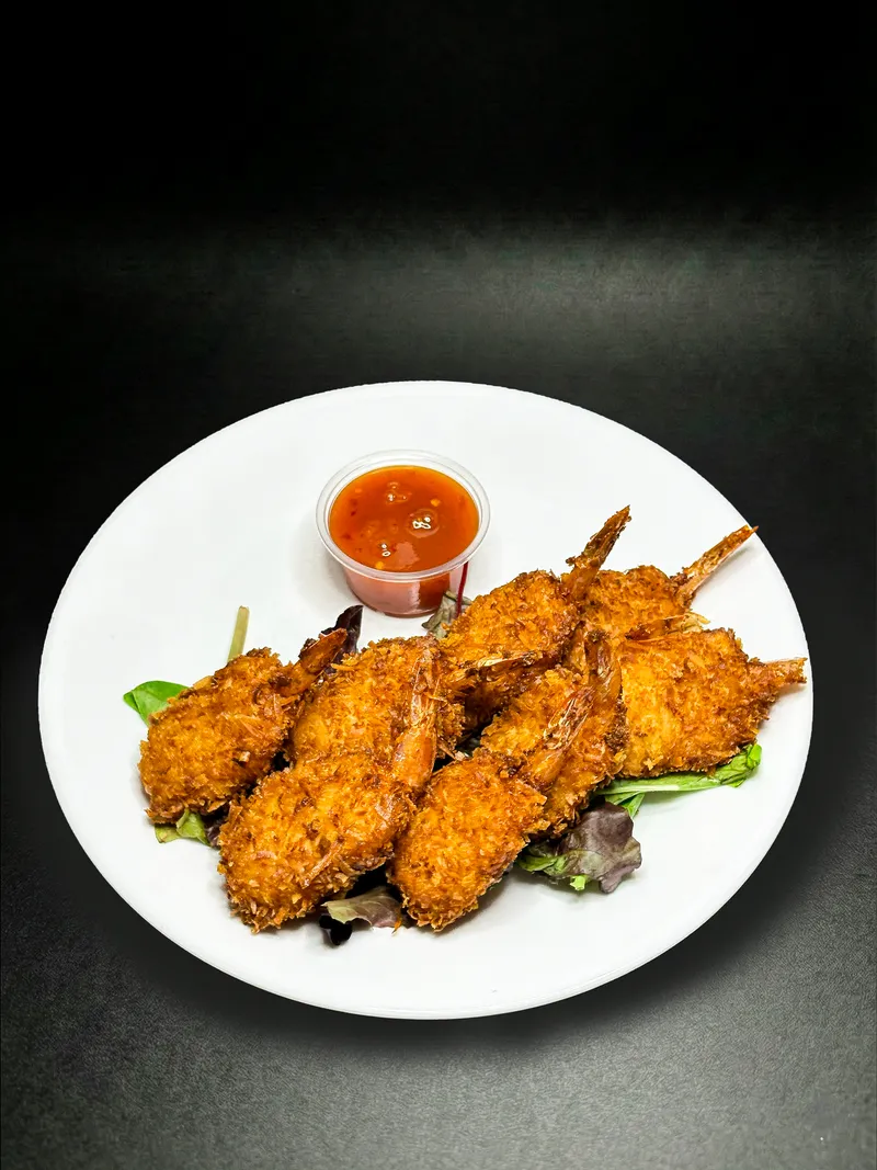 Coconut shrimp with dipping sauce at Macarena's Kitchen